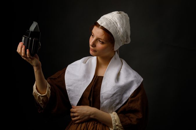 Medieval maid taking selfie