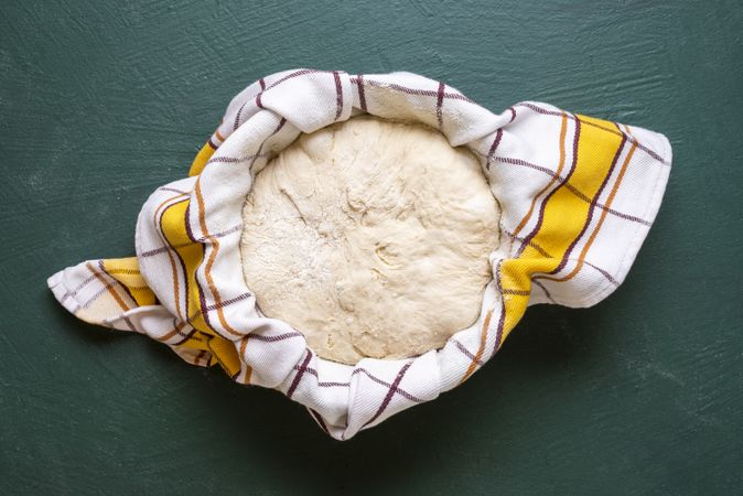Sourdough set to rise in a towel lined bowl