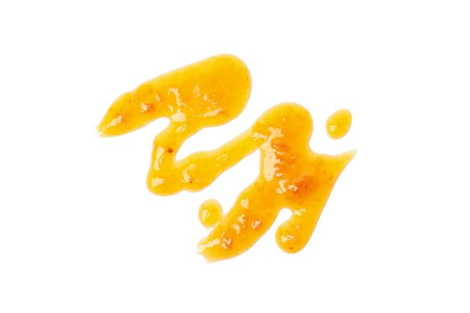 Delicious apricot jam isolated on plain background