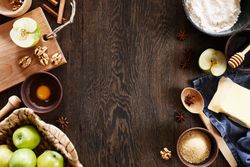 Top view of apple pie dessert ingredients with copy space
