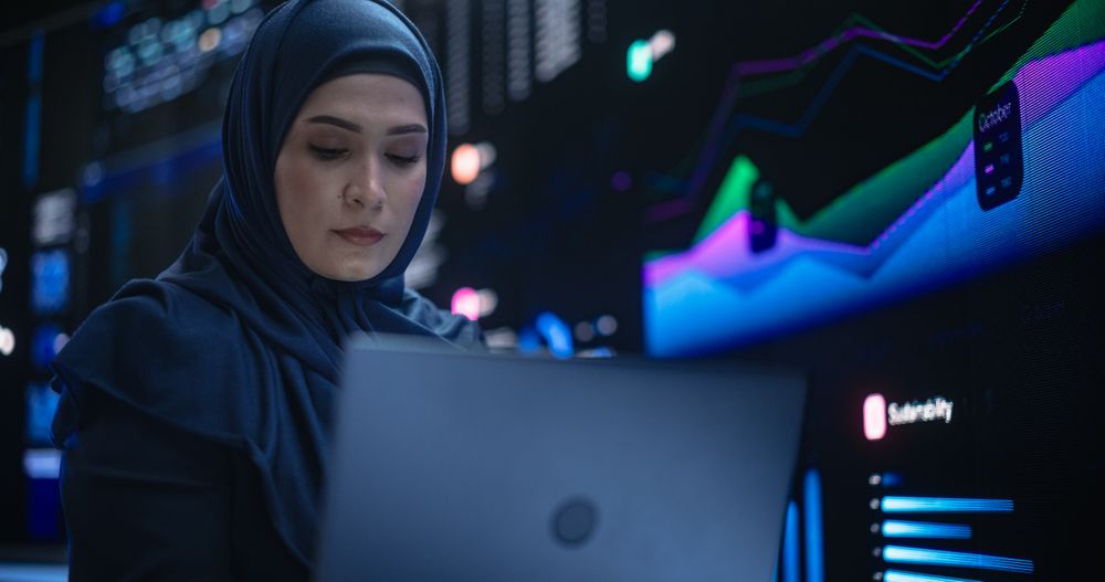 Portrait of Arab Female Working in an Advanced Technology Company. Woman Wearing a Hijab,