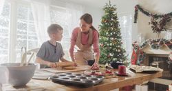 Portrait of Mother and Son Preparing for Baking Gingerbread on Christmas.