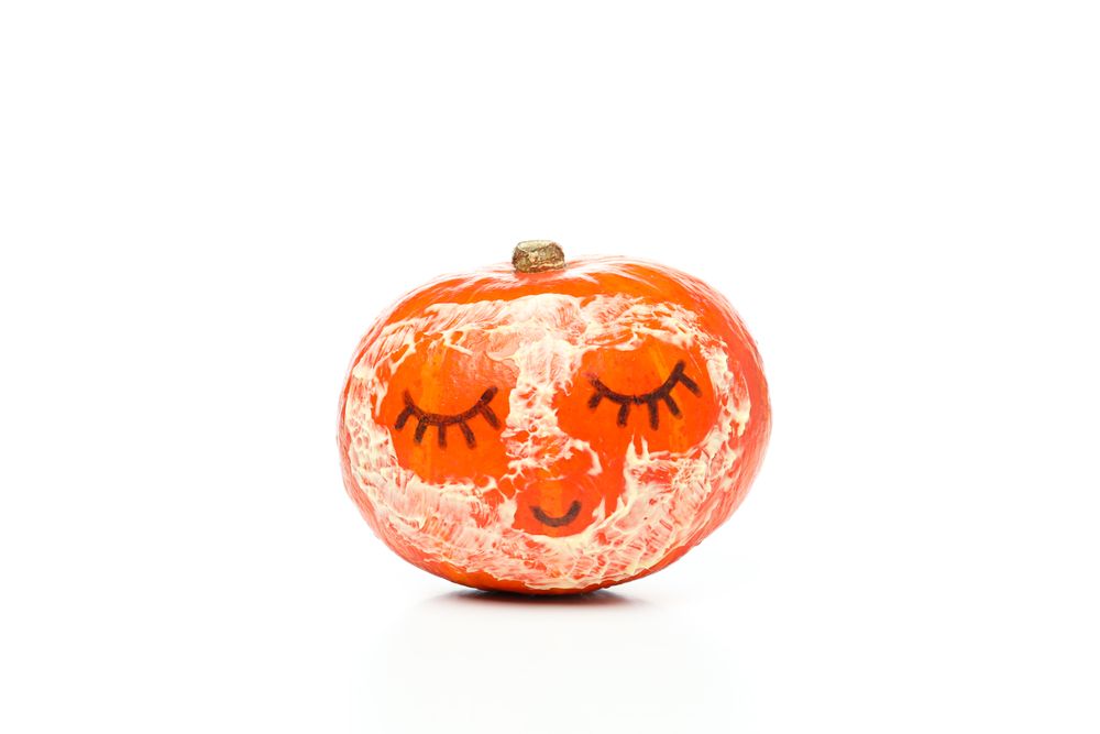 Skin care and body care concept - pumpkin cosmetic, isolated on blank background