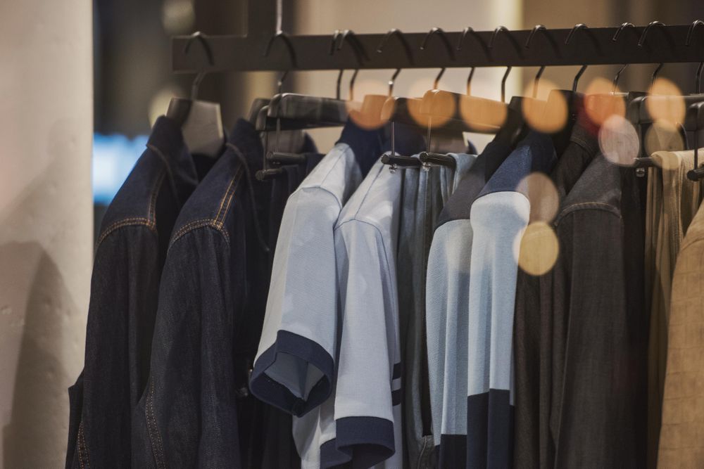 Clothes rack of men's casual outwear in fashion store