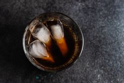 Top view of glass of cola