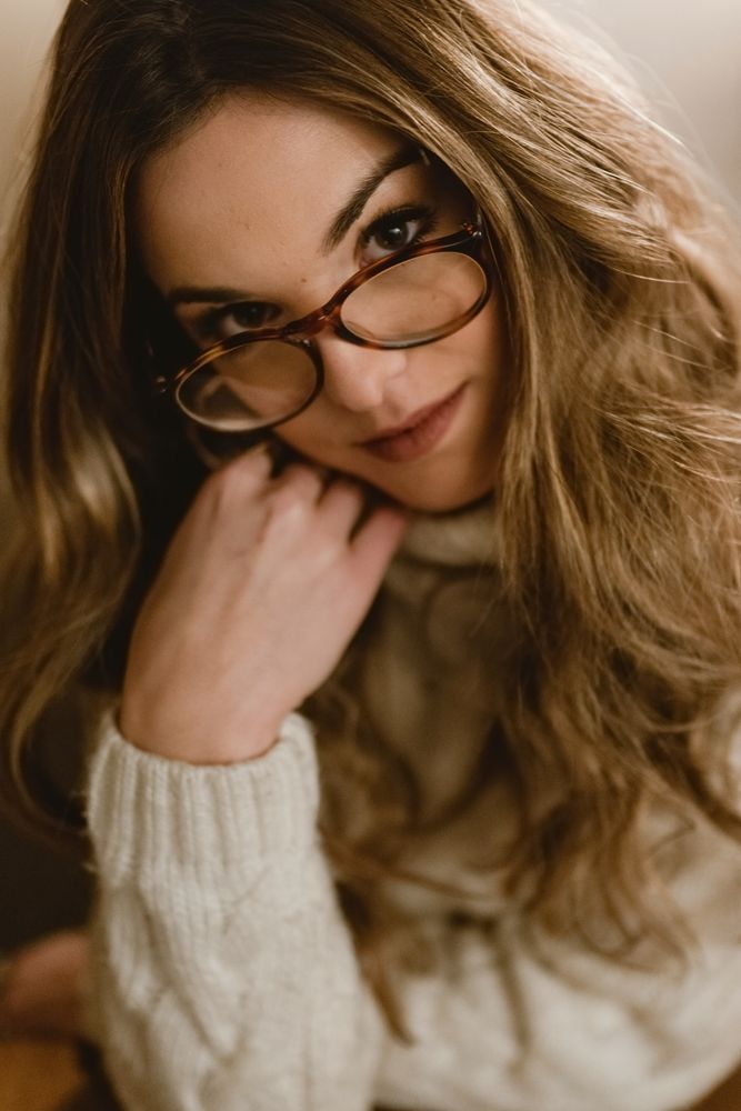 female at cafe table