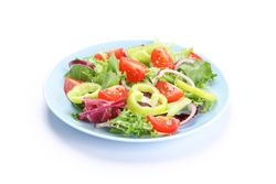 Salad of fresh vegetables isolated on plain background