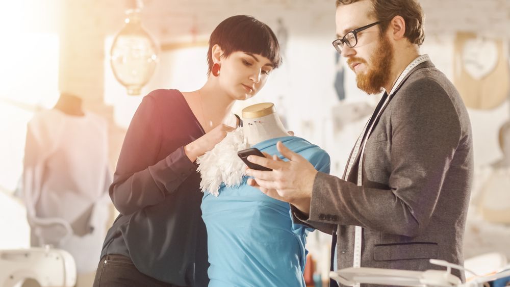 Male and Female fashion, designers are Working on Tailored Mannequin Wearing Clothes.