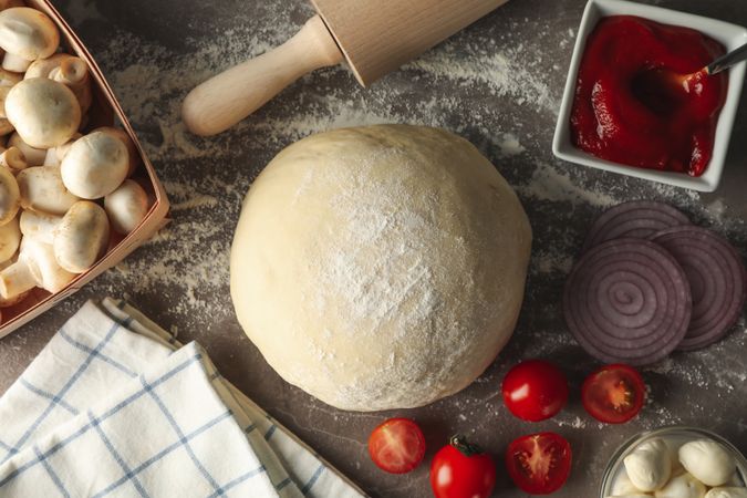 Ingredients for cooking pizza on gray background