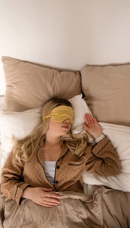 Woman sleeping with eye mask