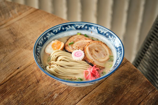 Bowl with delicious ramen dish