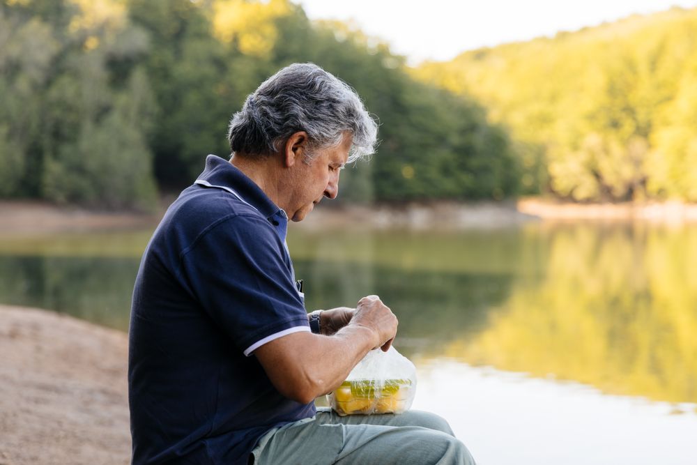 Man preparing to eat fruit