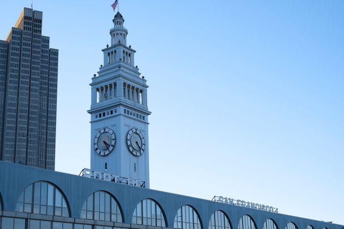 Clock tower of railway station in city
