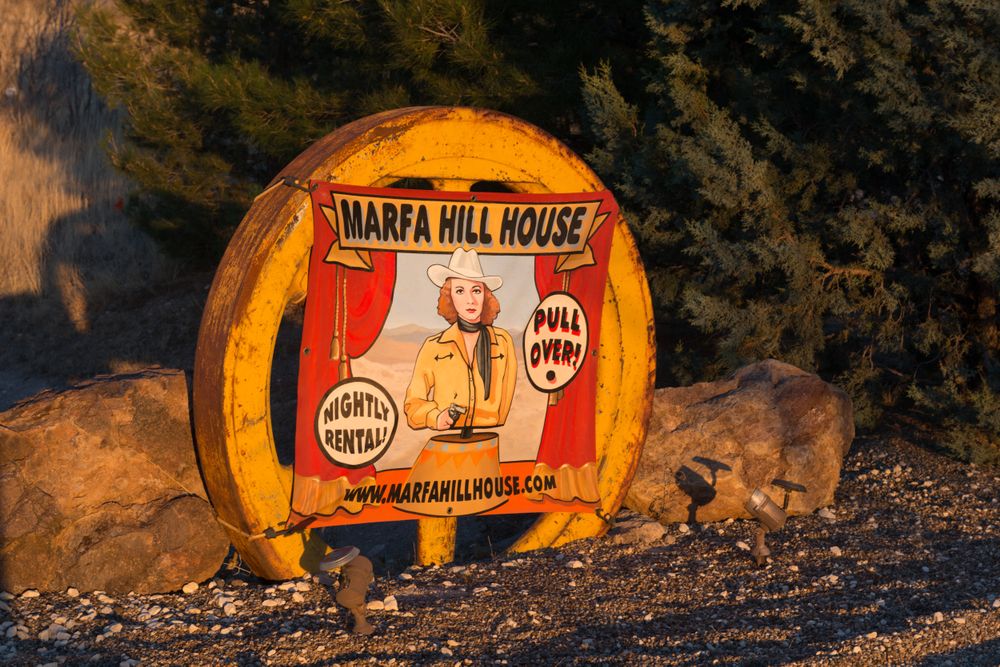 Nostalgic sign announcing the Marfa Hill House, Marfa, Texas