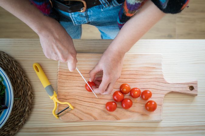 Woman preparing vegetable salad