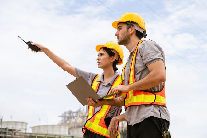 Engineer worker checking project at petrochemical factory or refinery oil plant industrial.