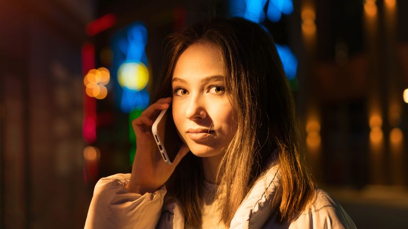 Woman enjoying nightlife in city