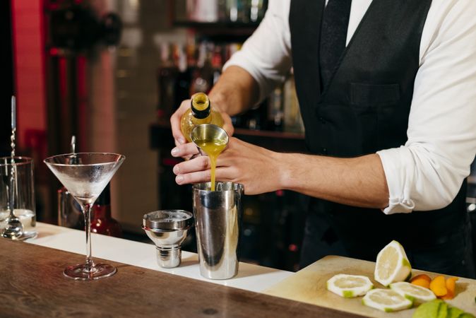 Barman working making drinks