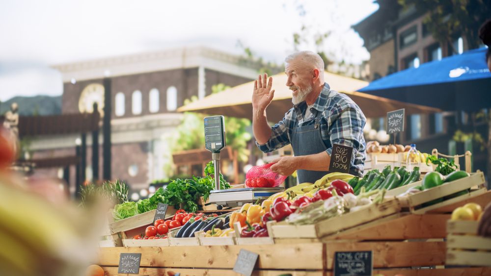 Cheerful Local Farmer Running a Small Business, Selling Sustainable Farm Fruits and Vegetables.