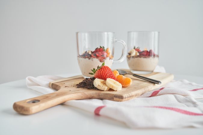 Delicious breakfast with fruits and berries served on table