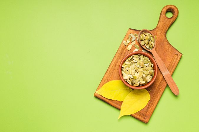 Cooking ingredients for fall season - pumpkin seeds, pumpkin