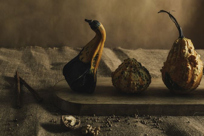 Small different pumpkins with condiments
