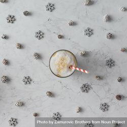 Snowflakes and pinecones on marble background with coffee 5XKXG0