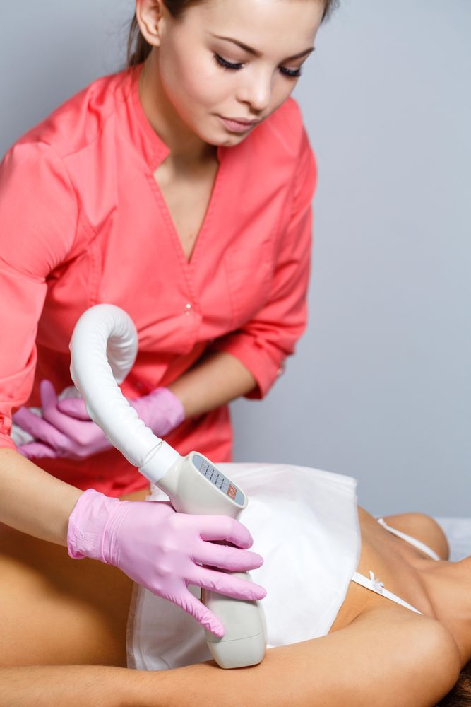 Cosmetologist doing beauty treatment on client, vertical composition