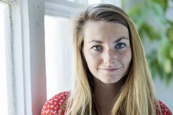 Portrait of happy young woman smiling