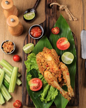 Balinese Roast Chicken Stuffed with Cassava Leaves.