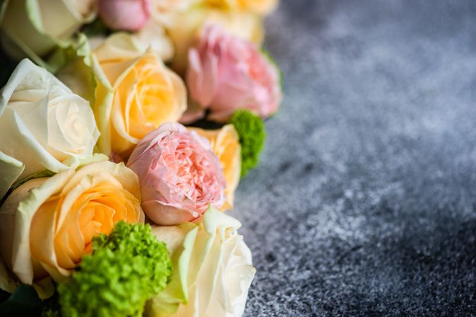 Close up of spring flowers on grey table