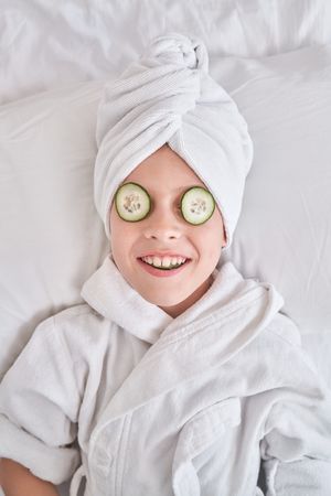 Boy enjoying spa procedures at home