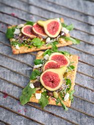 Fig slices on wooden table