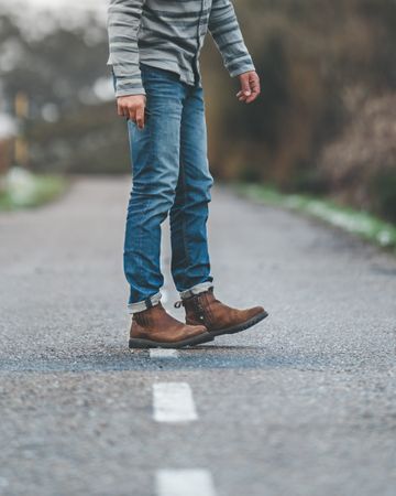 Man walking on country road