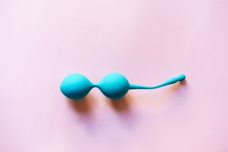 Kegel balls on pink background