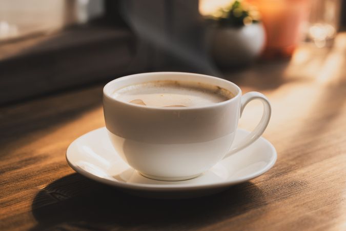 Warm Coffee Cup on Table
