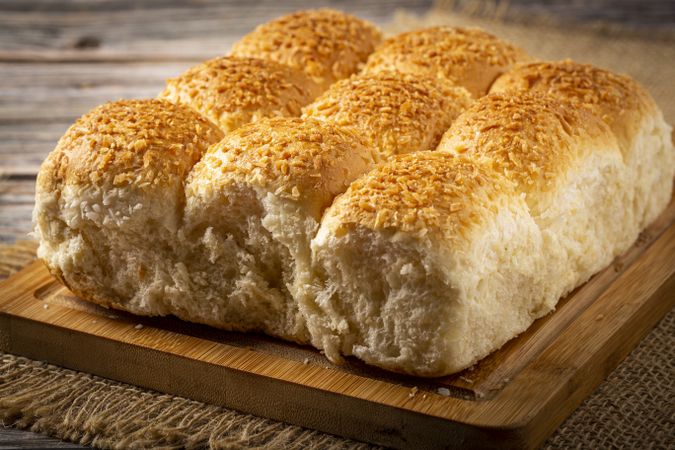 Coconut bread on the wooden table.