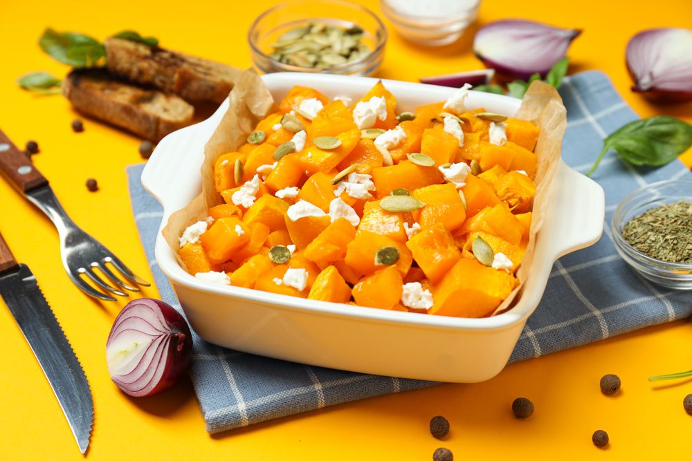 Concept of tasty homemade dish - baked pumpkin