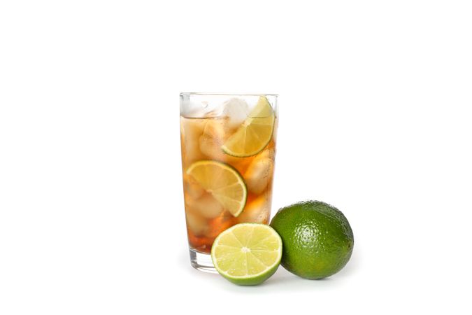 Glass of cold cola isolated on blank background