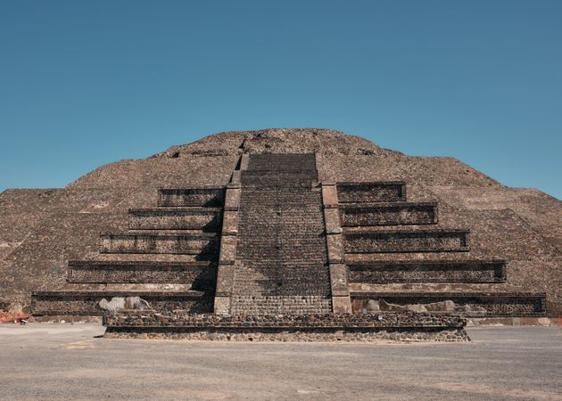 Front view of pyramid in Mexico against a clear blue sky