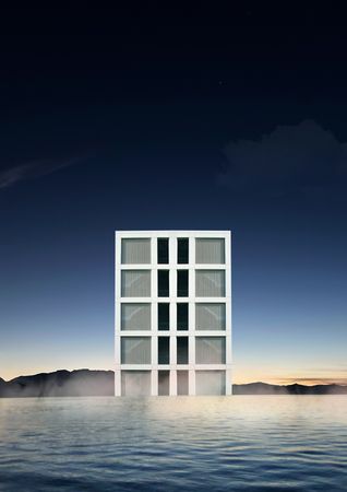 Architectural building floating on water