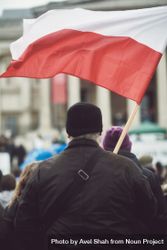 London, England, United Kingdom - March 5 2022: Man with Polish flag in Trafalgar Square 42Oedb