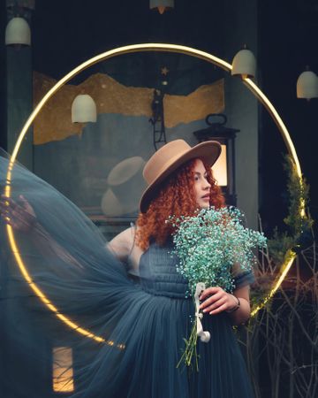Street portrait of female in hat