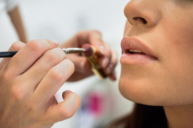 Woman having make up applied by a professional