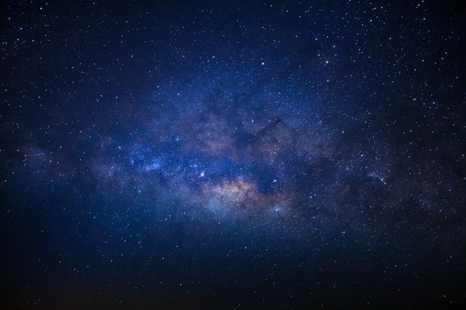 The center of the milky way galaxy with stars and space dust in the universe, Long exposure photograph, with grain