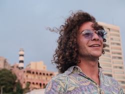 Portrait of Man with sunglasses smiling
