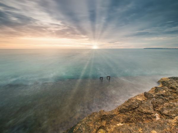 Sun rising over beautiful sea