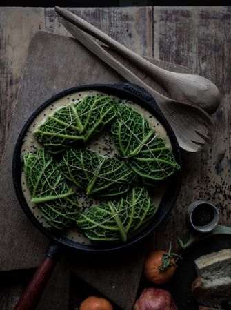 Cabbage rolls stuffed with rice in frying pan