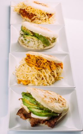 Latin American breakfast, specifically in countries such as Venezuela and Colombia, Arepas with several ingredients to fill like chicken, meat, avocado, cheese
