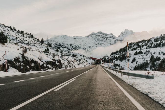 Countryside road between snow hills
